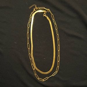 Gold layering necklaces.